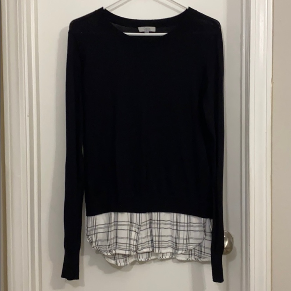 Black sweater with layered plaid button down look